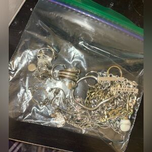 Bag of Mostly Silver Toned Jewelry